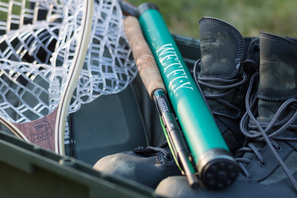 Collapsed WetFly Komodo Creek Flex Tenkara rod next to a rod tube