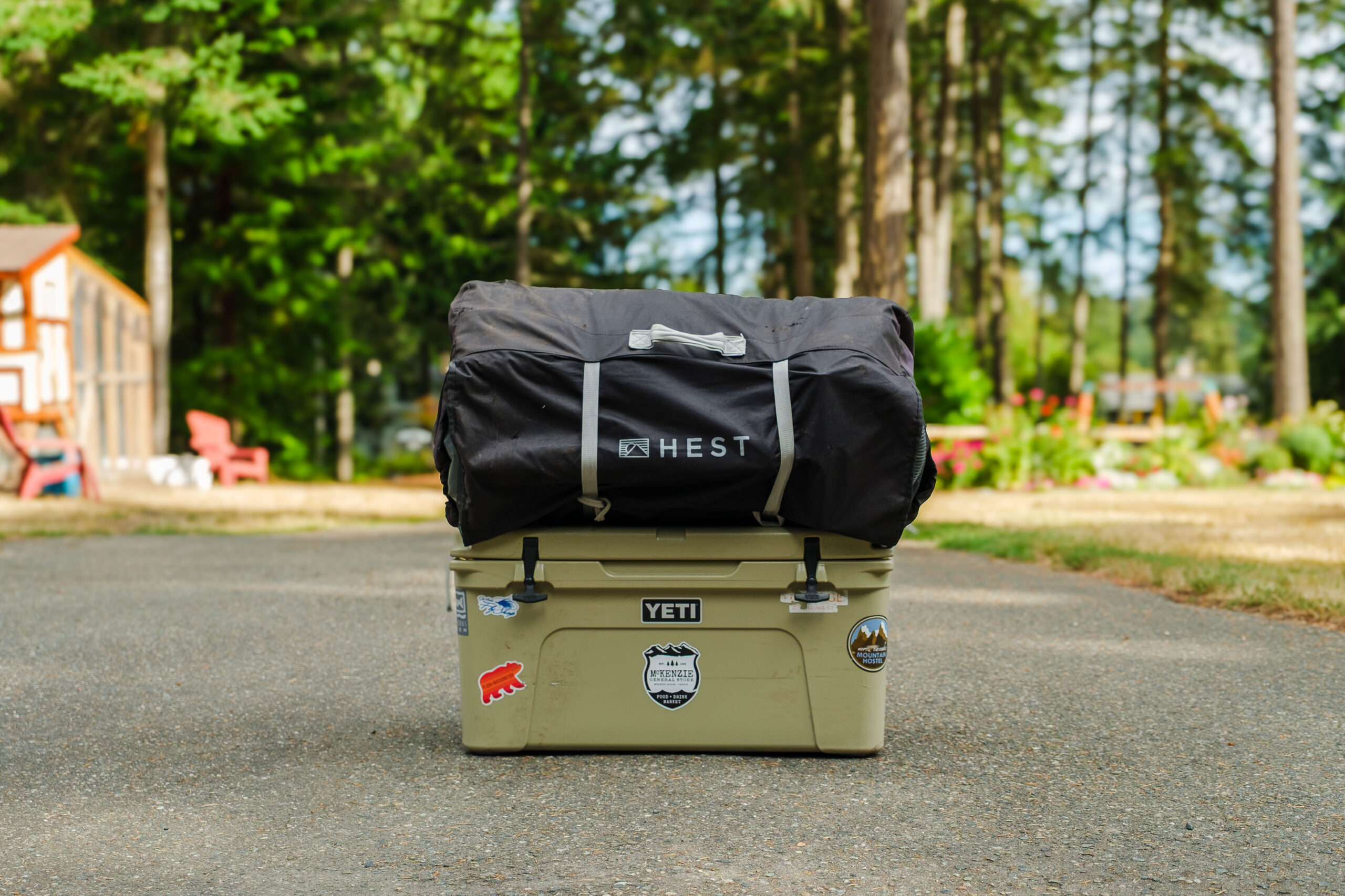 A Hest Sleep System in its carry bag on top of a Yeti 65 Cooler